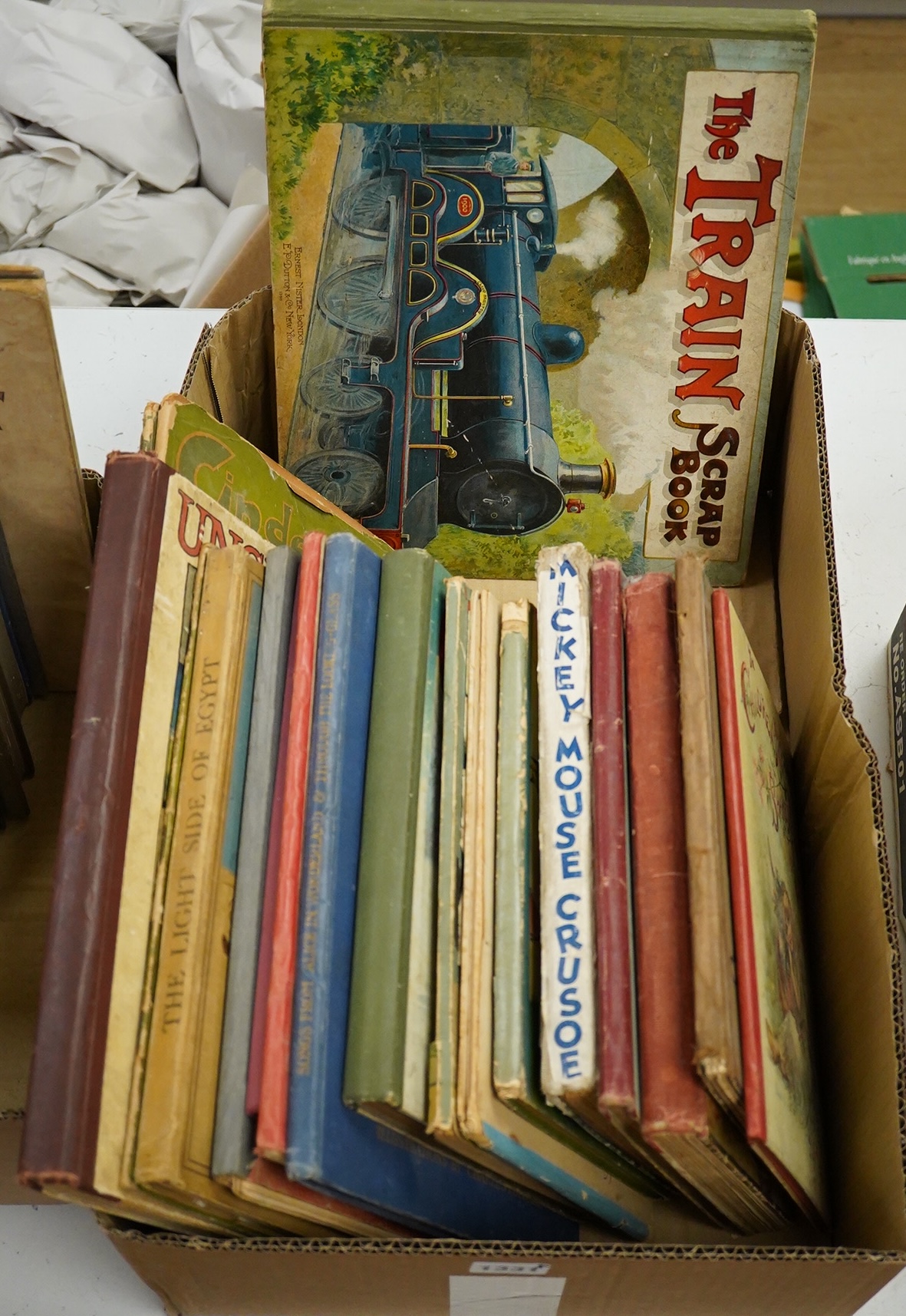 Children’s works - The Train Scrapbook, Ernest Nister, London and E.P. Dutton & Co., New York, [c. 1910]; Disney, Walt - Mickey Mouse Crusoe, 1st UK edition, Collins Clear-Type Press, [1935]; Harris, Joel Chandler - Uncl